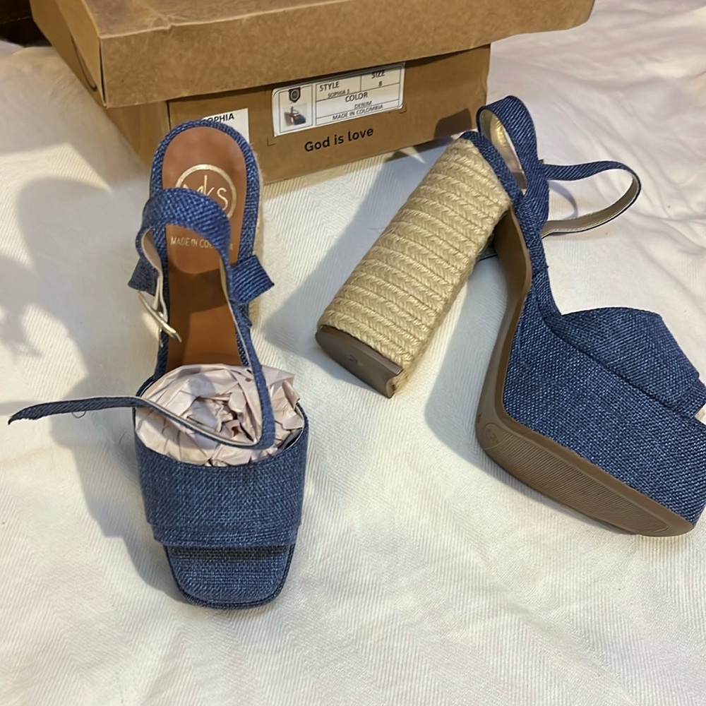 Denim platforms. Never worn.